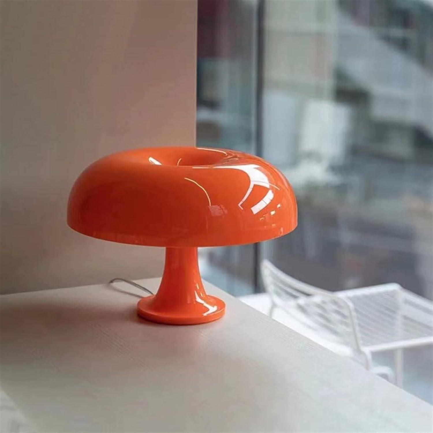 orange mushroom lamp on the table